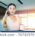 Businesswoman handling office management and lead  50742970