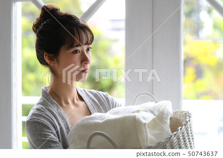 Woman housework laundry Woman housework laundry 50743637