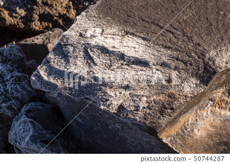 Lava stones with ice cover in the morning 50744287