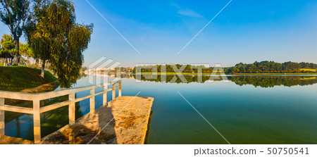 Sunrise over Xuan Huong Lake, Dalat, Vietnam. Sunrise over Xuan Huong Lake, Dalat, Vietnam. 50750541