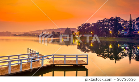 Sunrise over Xuan Huong Lake, Dalat, Vietnam. Sunrise over Xuan Huong Lake, Dalat, Vietnam. 50750556