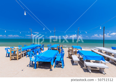 Tropical seaside dining table in thailand Tropical seaside dining table in thailand 50751512