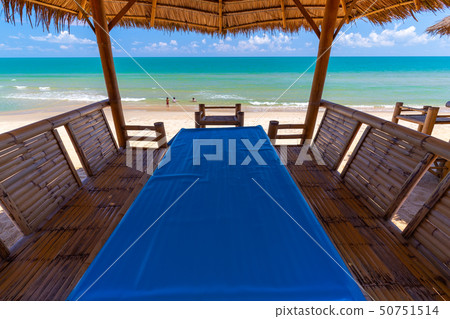 Tropical seaside dining table in thailand 50751514