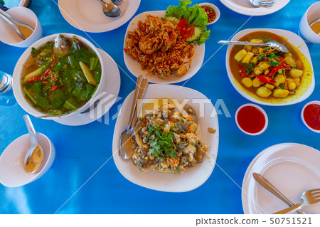 Tropical seaside dining table in thailand 50751521