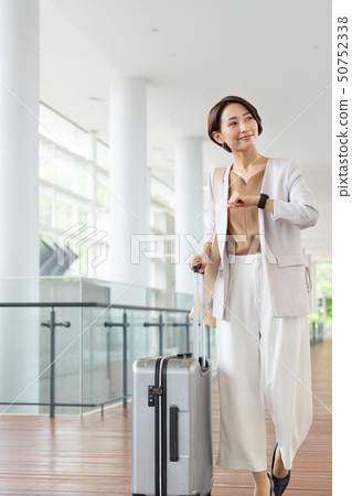 Businesswoman middle woman airport business image Businesswoman middle woman airport business image 50752338
