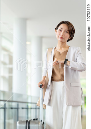 Businesswoman middle woman airport business image Businesswoman middle woman airport business image 50752339