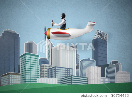 Businessman sitting in small propeller plane Businessman sitting in small propeller plane 50754423