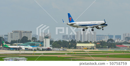 Passenger airplane landing at the airport Passenger airplane landing at the airport 50758759