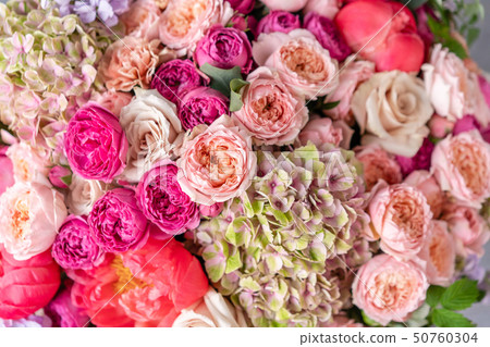 Close-up Large Beautiful bouquet of mixed flowers. Flower background and Wallpaper. Floral shop 50760304