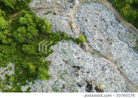 Aerial view of dump in forest. Pollution concept, top view. Aerial view of dump in forest. Pollution concept, top view. 50760376