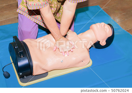 hand student Heart pump with medical dummy on CPR hand student Heart pump with medical dummy on CPR 50762024