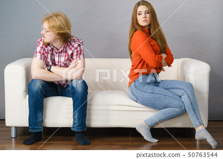 Woman and man after argue on sofa 50763544
