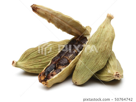 Cardamom pods and seeds isolated on white Cardamom pods and seeds isolated on white 50764742
