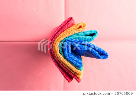 Colorful microfiber cloths on pink coral 50765009