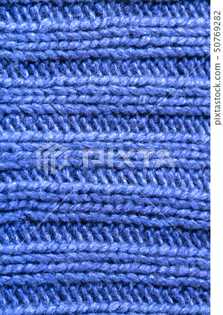 Blue ribbed knitted texture pattern Blue ribbed knitted texture pattern 50769282