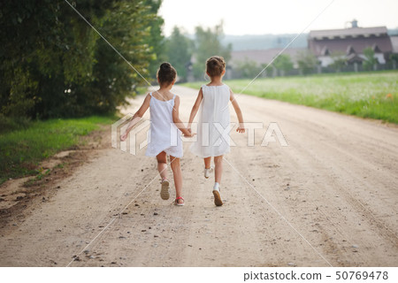 best happy friends playing in summer park 50769478