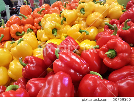 Red bell peppers. Sweet peppers, paprika on market Red bell peppers. Sweet peppers, paprika on market 50769560
