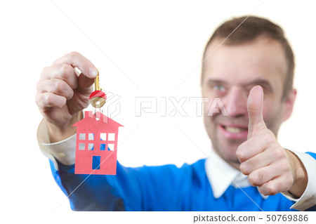 Man holding home keys Man holding home keys 50769886