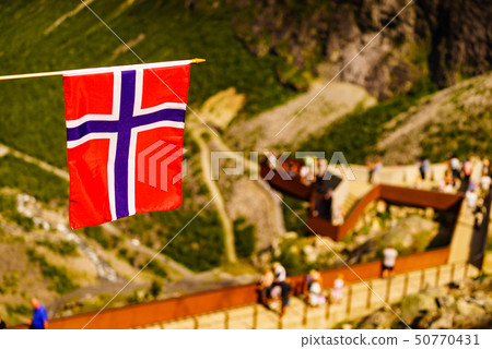 Norwegian flag and Trollstigen viewing point Norwegian flag and Trollstigen viewing point 50770431