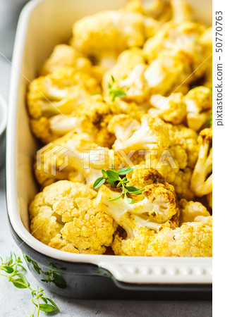 Baked cauliflower in oven dish  50770763