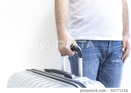 Men with a large suitcase 50771316