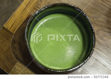 Bowl of hot matcha green tea drink Bowl of hot matcha green tea drink 50771348