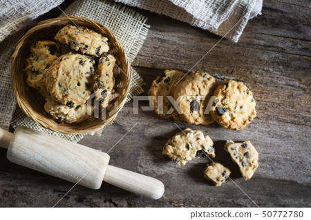 Cookies homemade in wooden  bowl on wood table 50772780