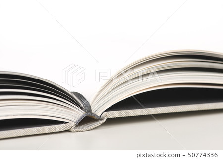Close up of a white open book with empty pages 50774336