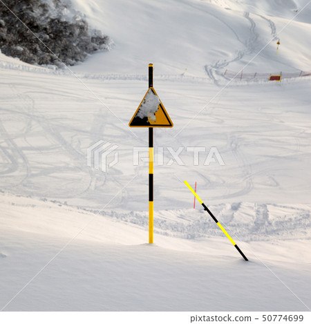 Ski slope at evening after snowfall 50774699