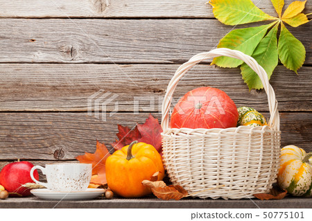 Autumn still life with pumpkins and leaves 50775101