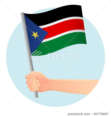 South Sudan flag in hand South Sudan flag in hand 50779807