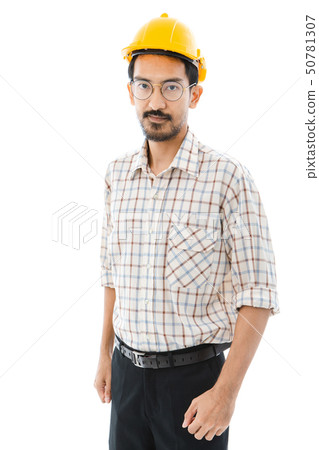Engineer man standing yellow helmet 50781307