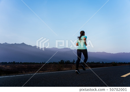 Woman enjoy running in the countryside. Woman enjoy running in the countryside. 50782001