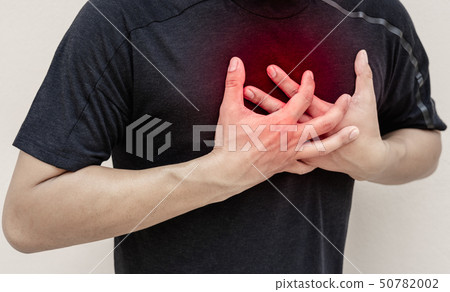 Man having a heart attack after work without break 50782002