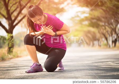 Sport girl have chest pain after jogging Sport girl have chest pain after jogging 50786206