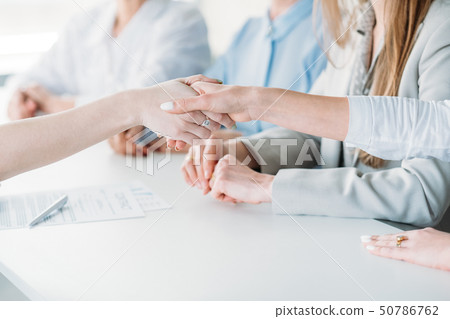 successful job interview congratulation handshake 50786762