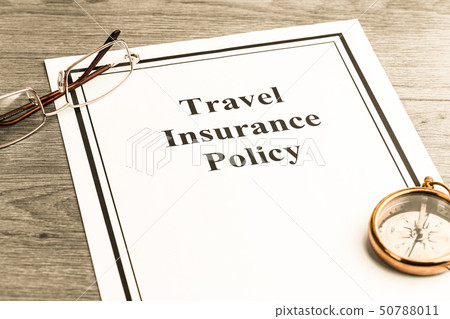 Travel Insurance Policy on Table. Business Concept 50788011