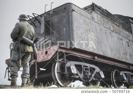 Nazis stand on the background of the train Nazis stand on the background of the train 50789716