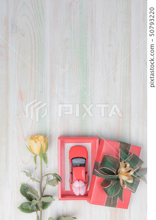 valentine love heart gift red toy car rose on wood 50793220