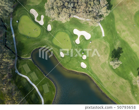 Aerial photo of green golf fields in spring 50793658