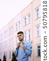 Beautiful young man outside portfolio 50795818