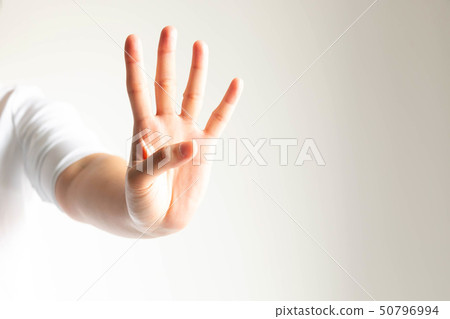 A hand showing number four on white background. 50796994