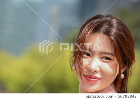 Model beauty basking in the sun outdoors Model beauty basking in the sun outdoors 50798842