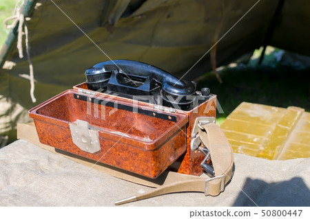 old military wired phone stands on the table old military wired phone stands on the table 50800447