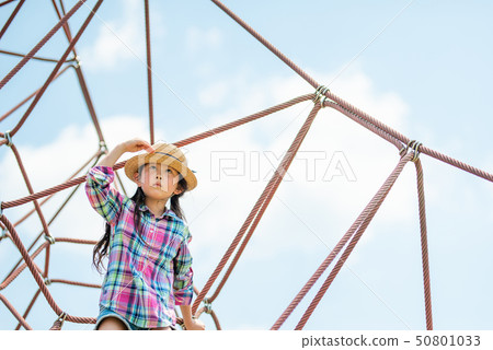 Girls playing in the park Girls playing in the park 50801033