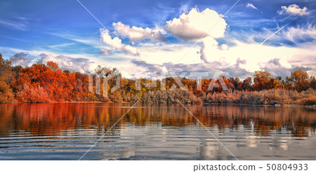autumn park by the lake. Blue sky autumn park by the lake. Blue sky 50804933
