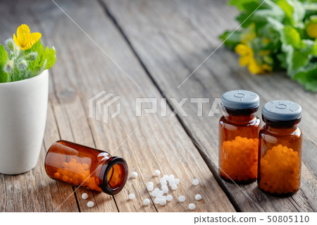 Bottles of homeopathic globules. Bottles of homeopathic globules. 50805110