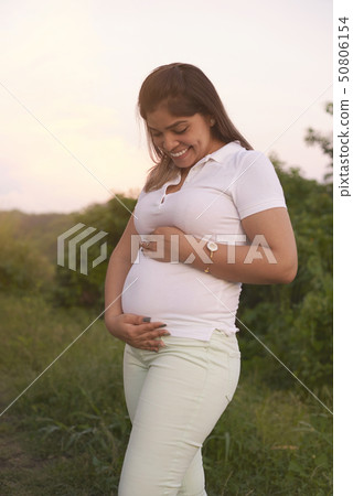 Happy smiling pregnant woman Happy smiling pregnant woman 50806154