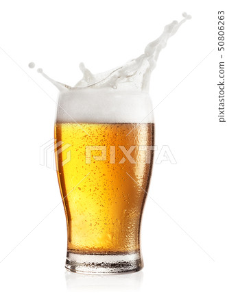 Steamed glass of light beer with splash Steamed glass of light beer with splash 50806263