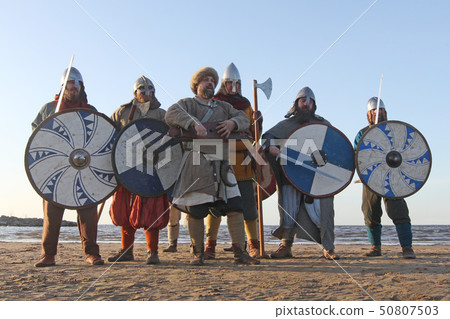 Man reenactor playing gusli Man reenactor playing gusli 50807503
